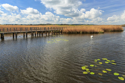 Scenic view of river against sky