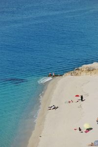 High angle view of beach against blue sky