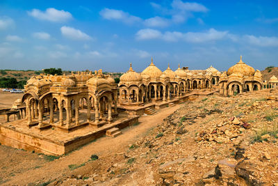 Old ruins of building against sky