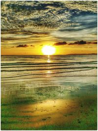 Scenic view of sea at sunset