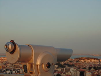 Close-up of cityscape against clear sky