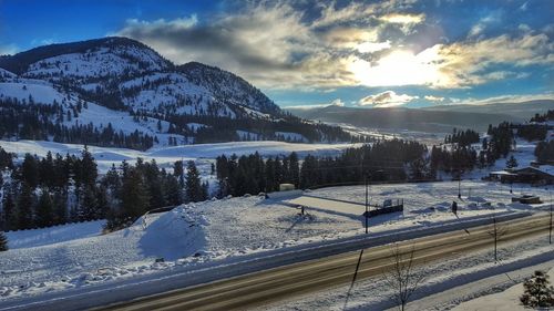 Scenic view of mountains against sky during winter