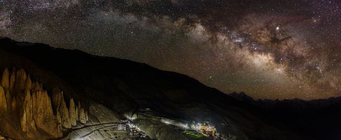 Scenic view of star field against sky at night