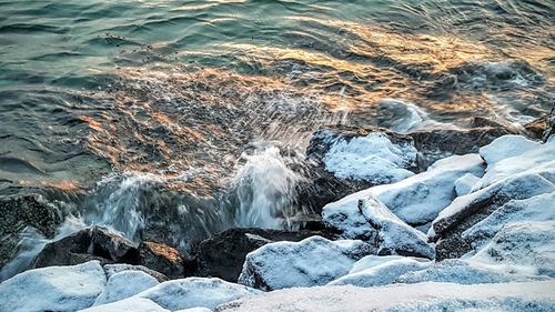Waves splashing on rocks