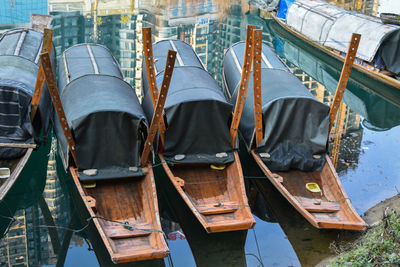 High angle view of chinese sailboats moored in lake