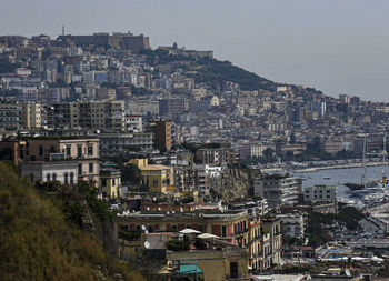 High angle view of buildings against sky