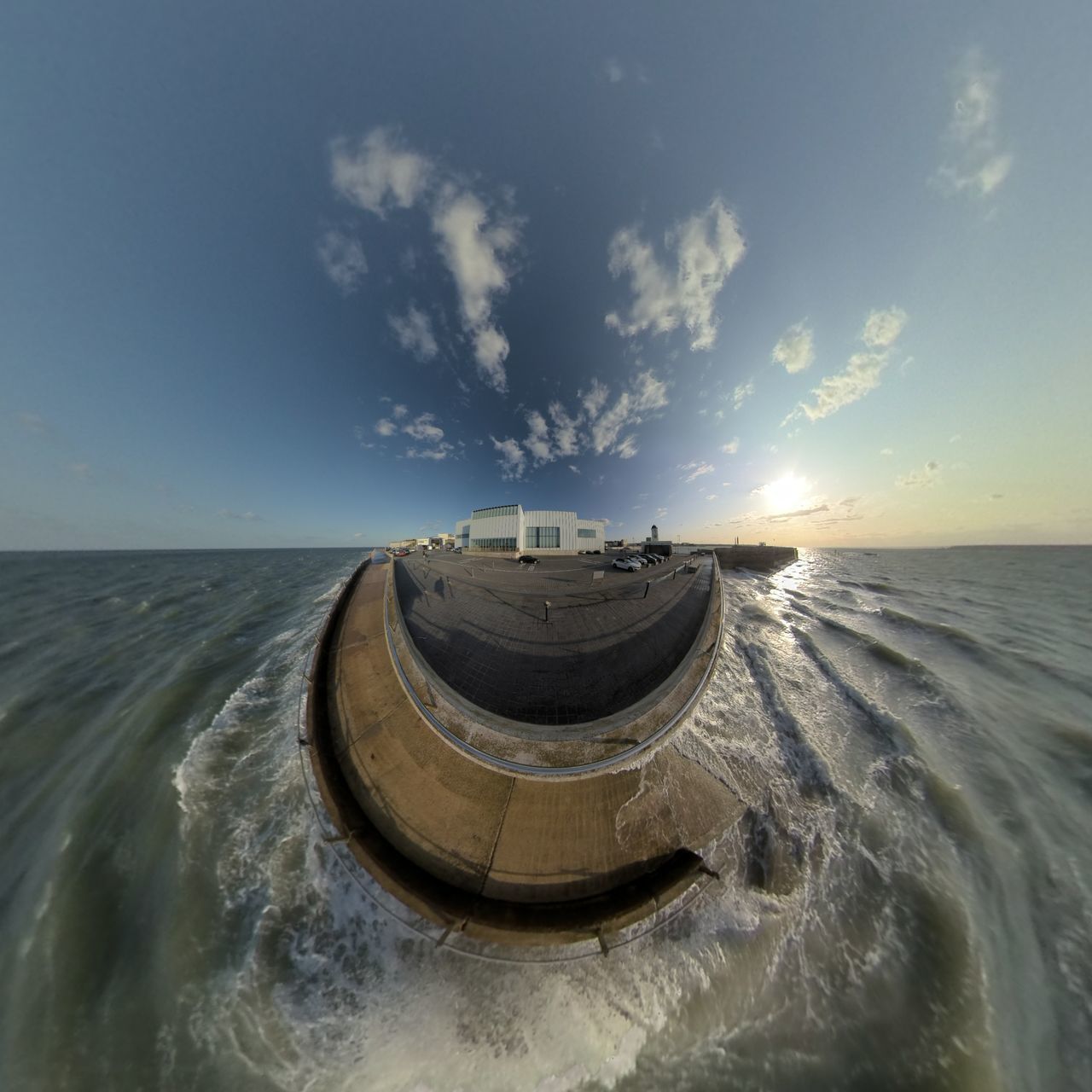 PANORAMIC VIEW OF BEACH AGAINST SKY