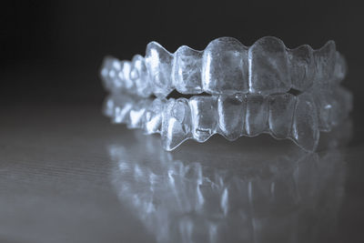 Close-up of artificial teeth on table