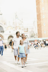 Parents with daughter sightseeing