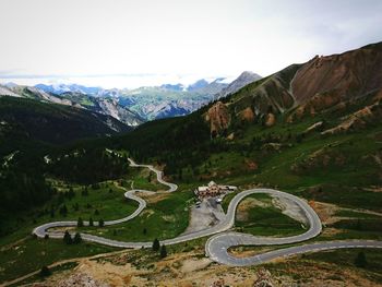 High angle view of winding road against mountains