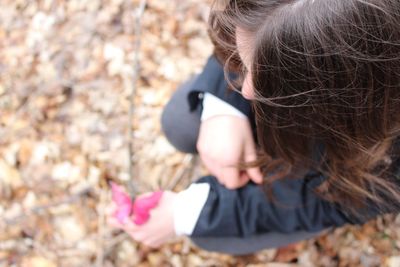 Close-up of girl with flowers