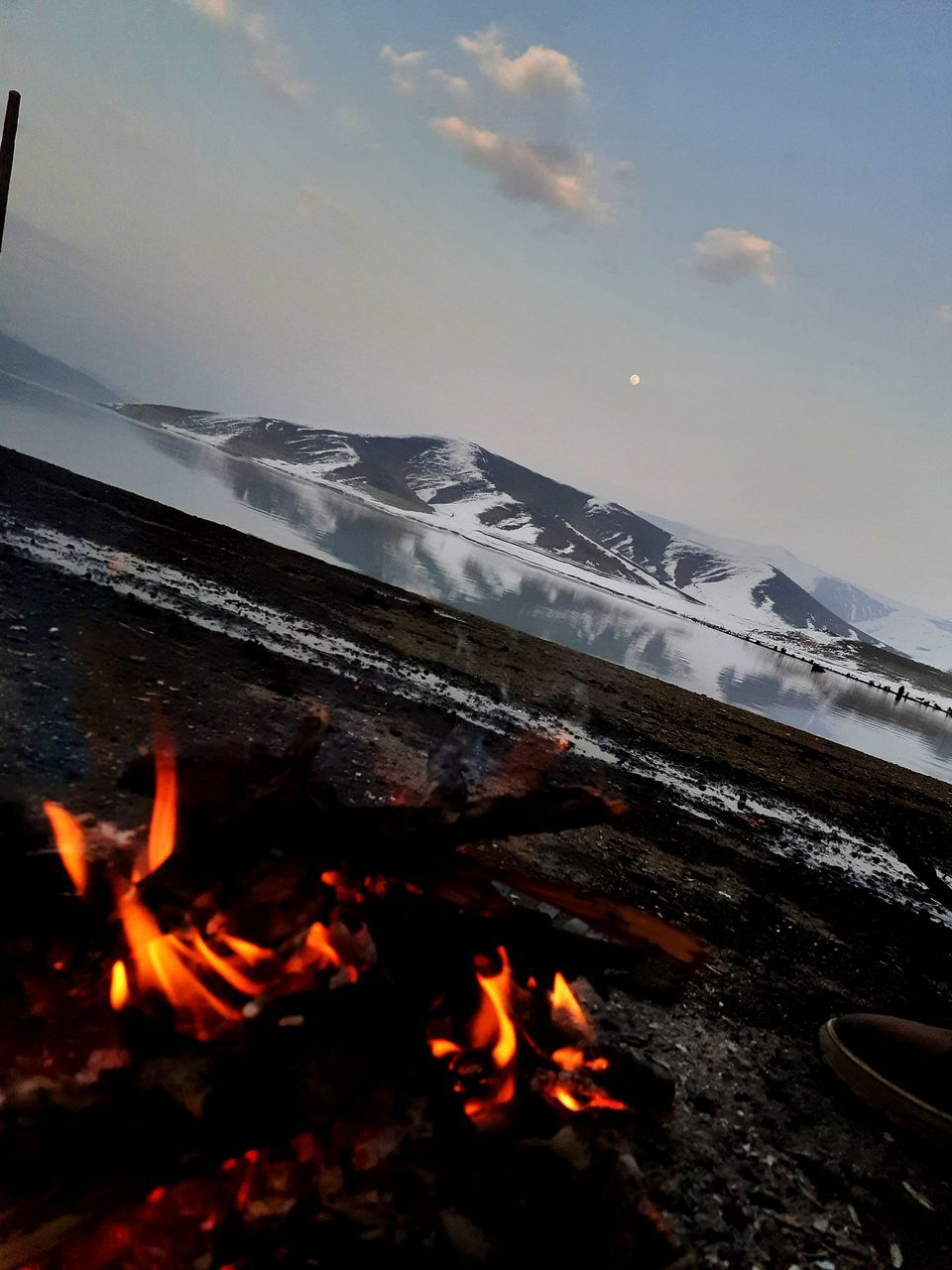 nature, heat, burning, flame, fire, sky, land, beach, no people, beauty in nature, water, motion, bonfire, sea, wood, environment, outdoors, winter, glowing, orange color, scenics - nature, log, campfire, camping, snow, cloud, mountain, day, long exposure
