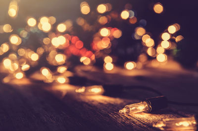 Close-up of illuminated string lights on table