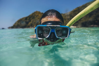 Portrait of man in swimming in lake