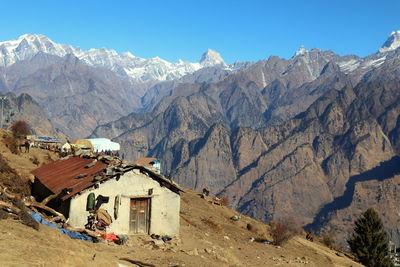 Scenic view of snowcapped mountains against sky