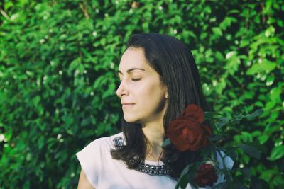 Portrait of a young woman looking away