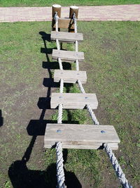 High angle view of bench in park