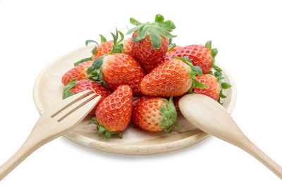 Close-up of strawberries against white background