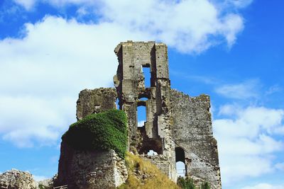 Low angle view of corfe castle against sky