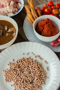 High angle view of chopped food in bowl on table