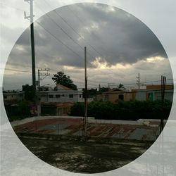 Built structure against cloudy sky