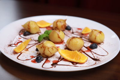 Close-up of food in plate on table