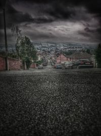 View of road against cloudy sky