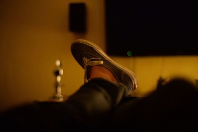 Low section of person wearing shoes