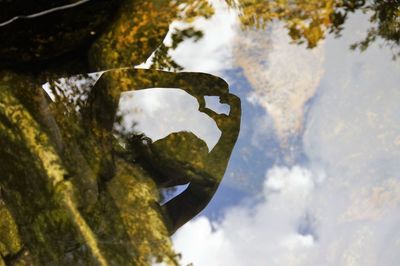 Close-up of metal against sky