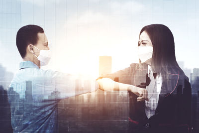 Digital composite image of woman with mobile phone