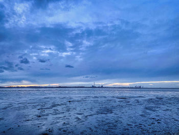 Scenic view of sea against sky at sunset