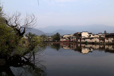 High angle view of town by river
