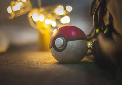 Close-up of illuminated ball on table