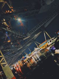 High angle view of illuminated ferris wheel at night