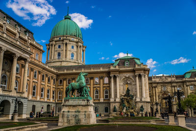 Low angle view of horse statue against buda castle