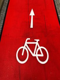 High angle view of bicycle symbol on road