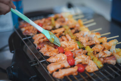 Close-up of meat on barbecue grill