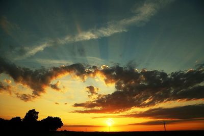 Sun shining through clouds