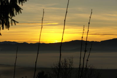 Scenic view of mountains at sunset