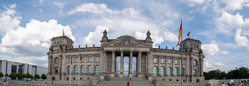 Panoramic view of historical building against cloudy sky