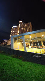 Low angle view of illuminated building at night