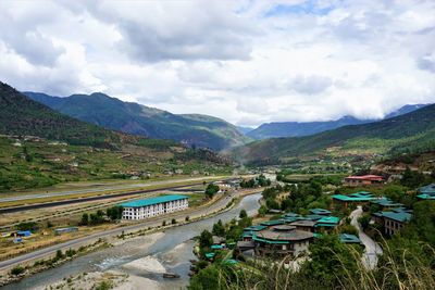 High angle view of road by mountain against sky