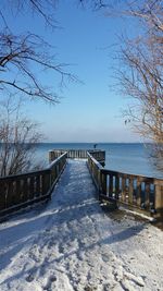 Scenic view of sea against sky during winter