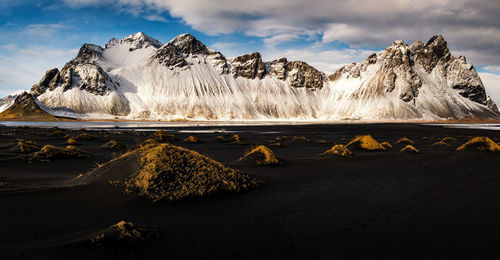 Panoramic view of lake against sky during winter