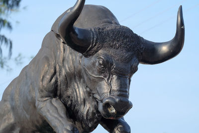 Low angle view of statue against clear sky