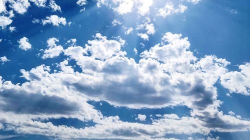 Low angle view of clouds in blue sky
