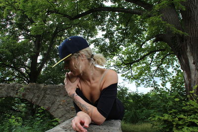 Woman sitting in a forest