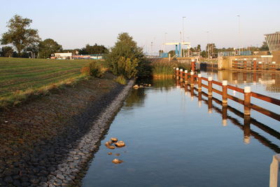 Scenic view of river against clear sky
