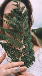 Hiding behind a leaf.