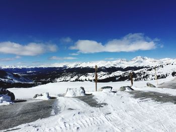 Scenic view of snowcapped mountains against sky